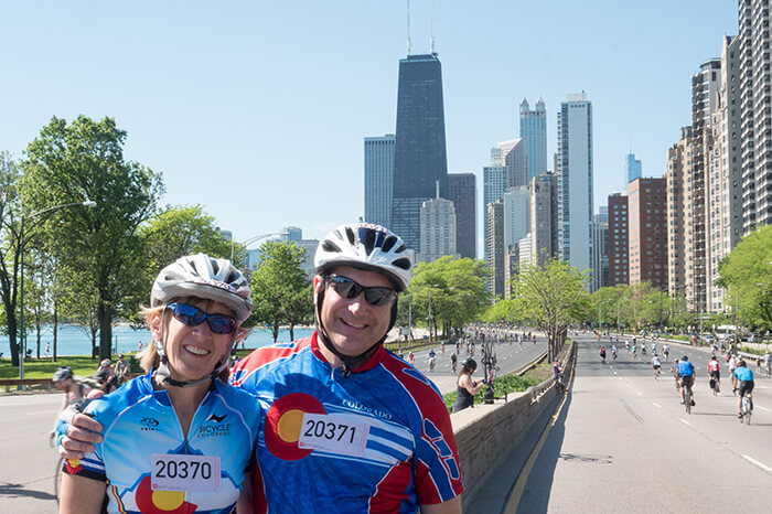 couple smiling on bikes